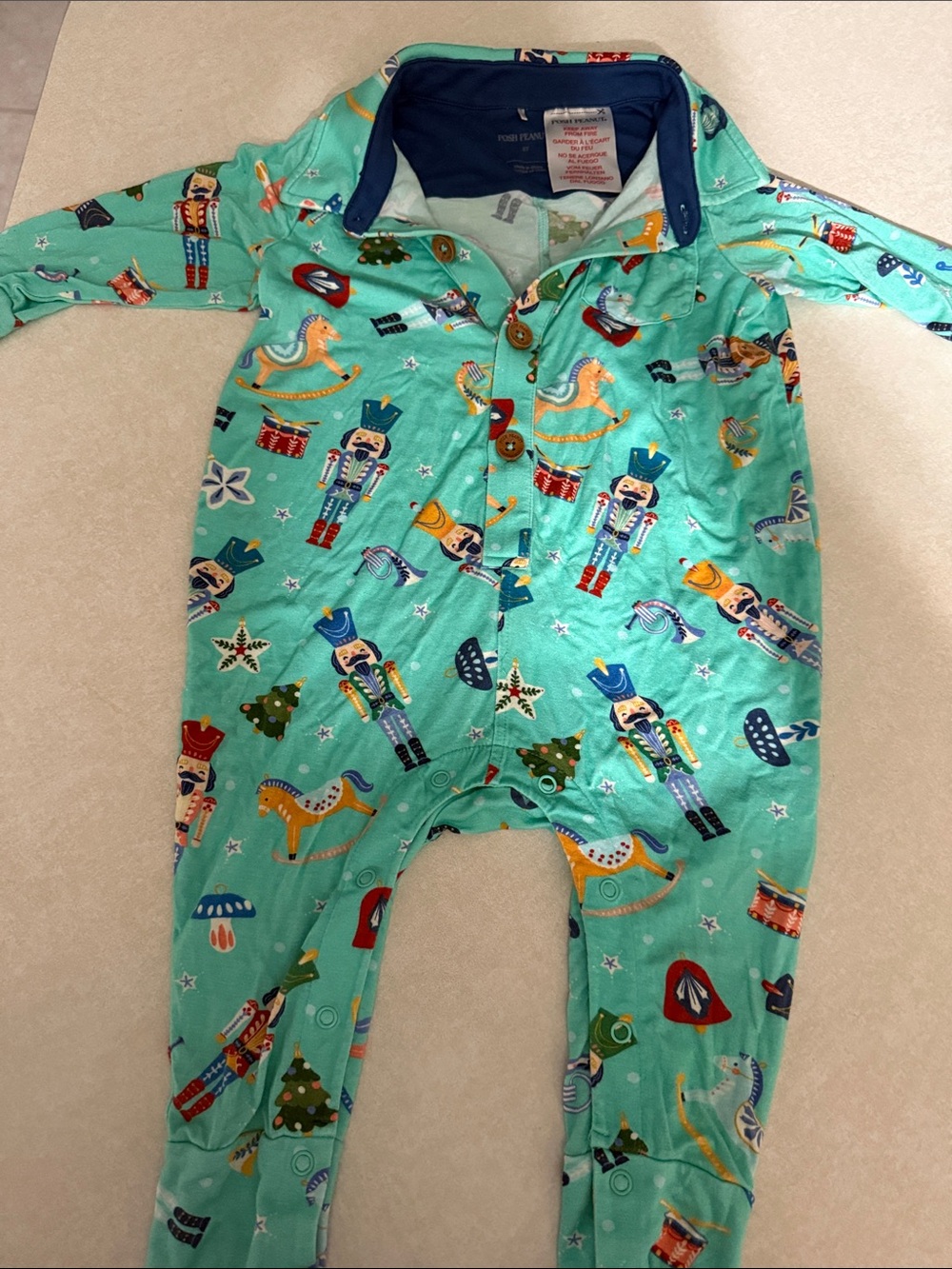 Posh Peanut Mint Green Nutcracker Print One-Piece Bodysuit